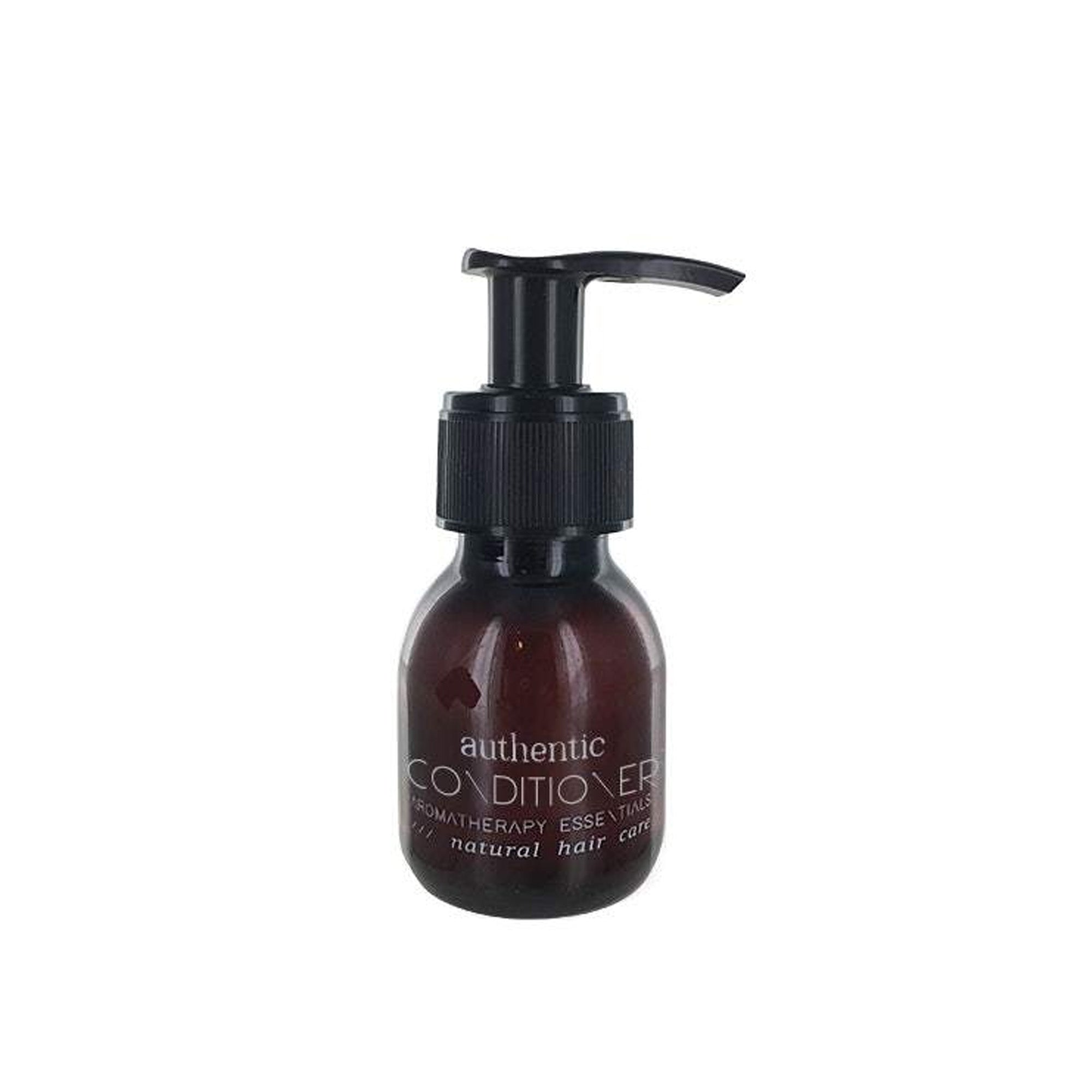 Een bruine pompflacon RainPharma Authentic Conditioner (finishing conditioner) 60 ml - Reisformaat op een witte achtergrond - ideaal voor een natuurlijke wasbeurt en perfect voor op reis.