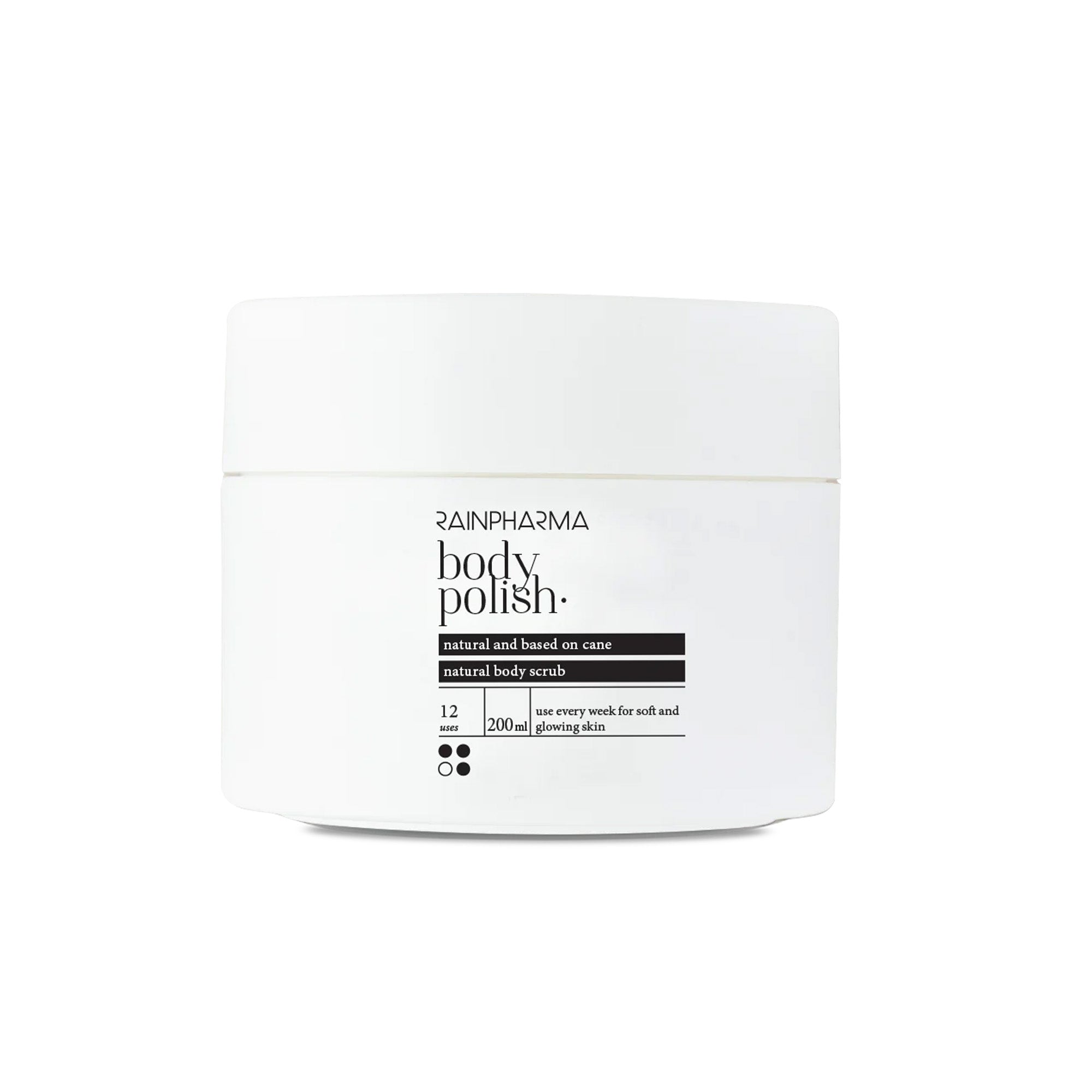 Een witte pot RainPharma Body Polish / Glowing Sugar Cane Scrub bodyscrub met zwarte tekst en een minimalistisch etiket, met 200 ml scrub van suikerriet en essentiële oliën voor een natuurlijk stralende huid.