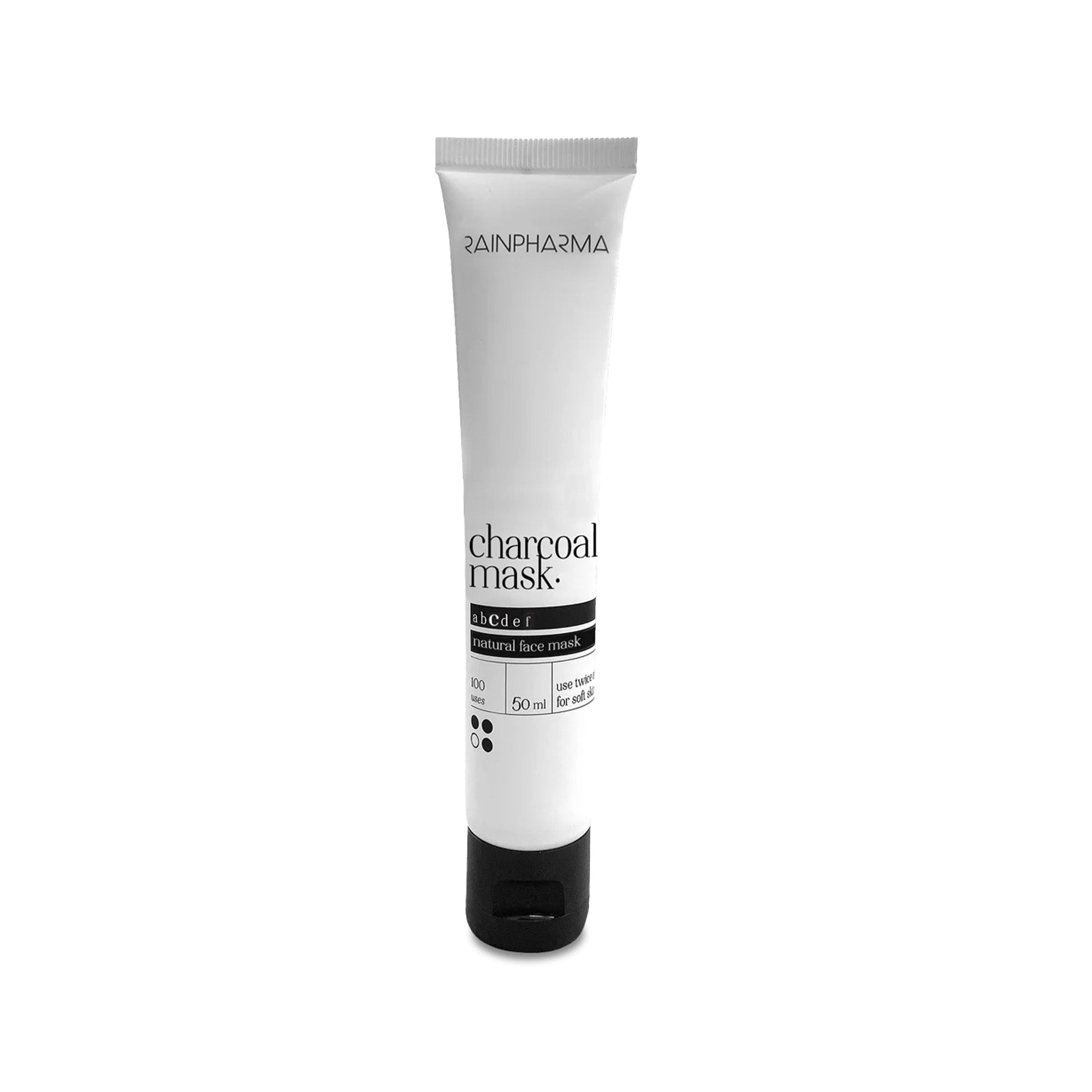 Een witte tube met het label "RainPharma Charcoal (Detox) Mask - zuiverend masker" met een zwarte dop, 50 ml voor de vette huid, wordt weergegeven tegen een effen witte achtergrond.