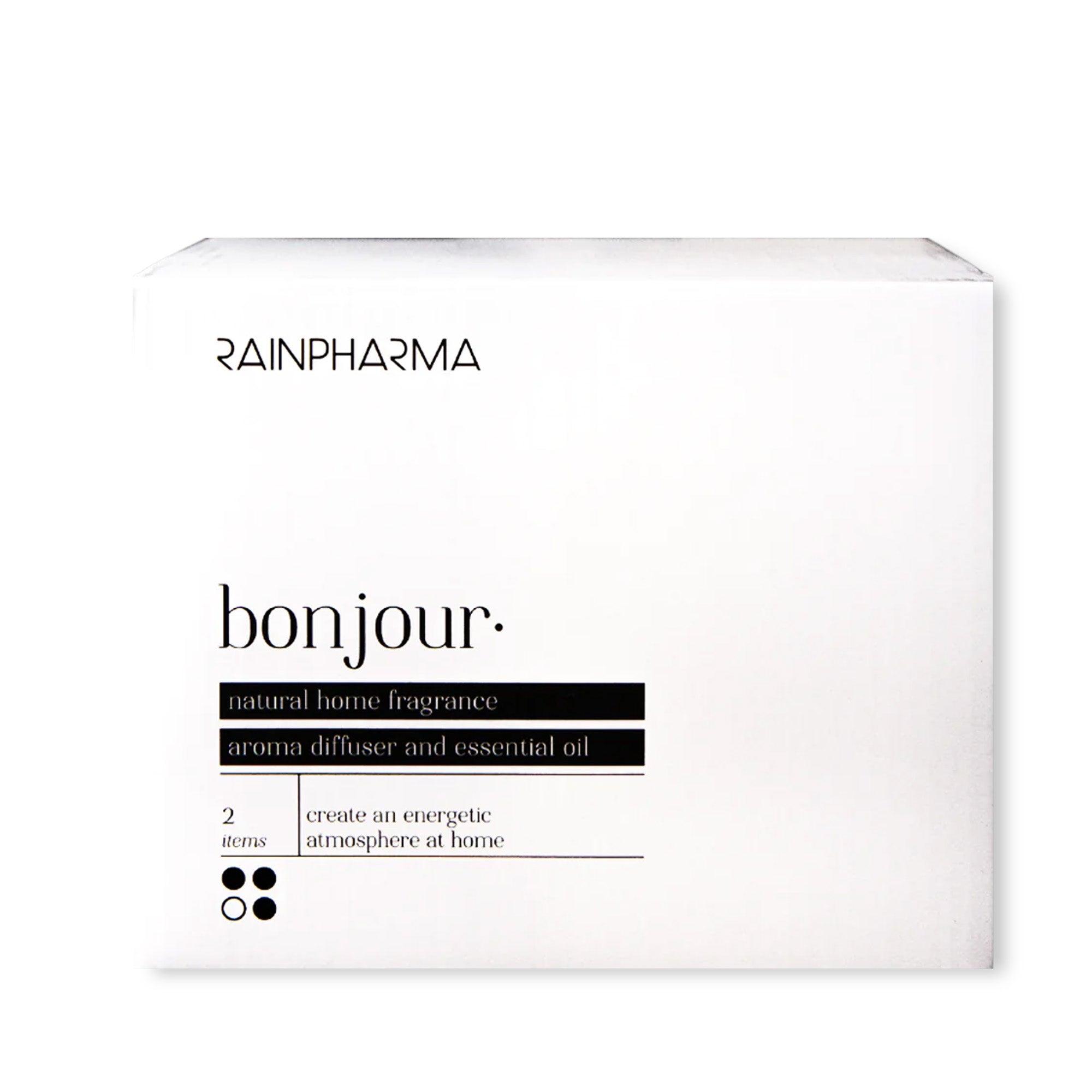 White RainPharma Aroma Diffuser Geschenkbox - Bonjour met tekst: "natuurlijke huisparfum, aroma diffuser en essentiële olie, 2 artikelen om een energieke sfeer in huis te creëren.