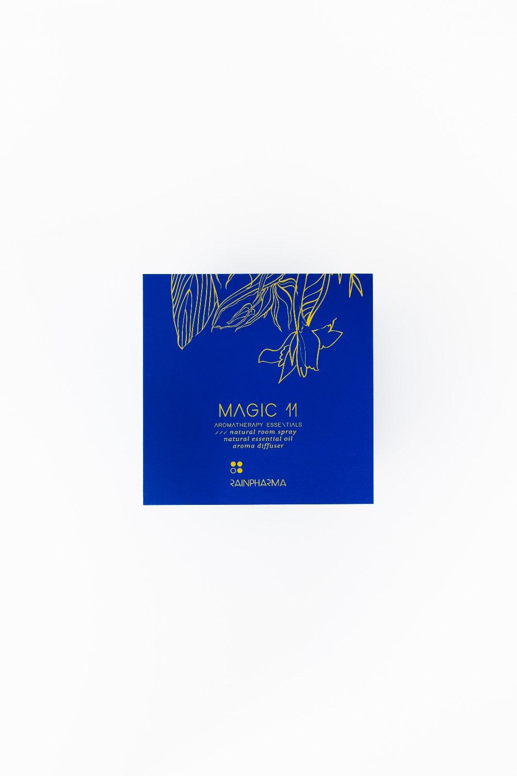 De Aroma Diffuser Geschenkbox - Magic 11 van RainPharma is een blauwe doos met gele bloemenlijnkunst, waarin de Essentiële Olie Magic 11 zit.