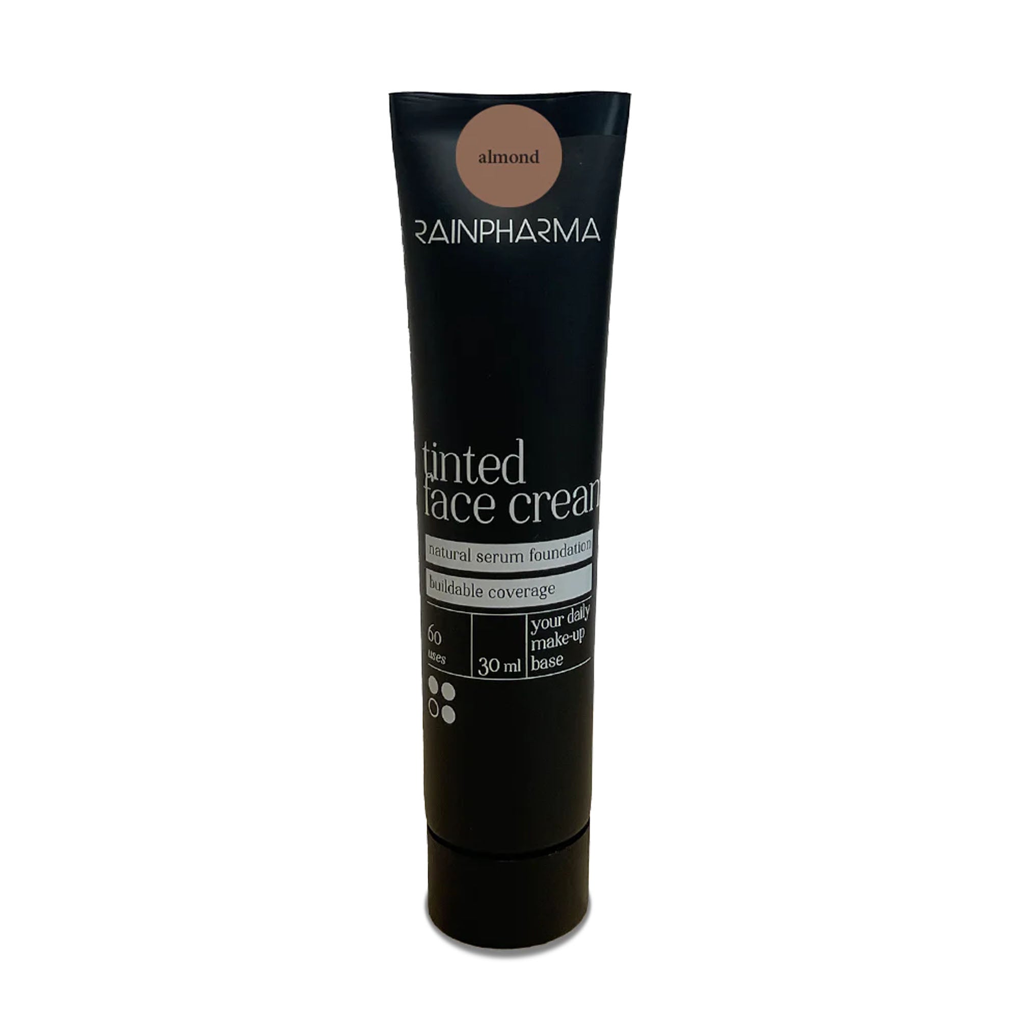 Een zwarte tube van 30 ml RainPharma Make Up - Getinte gezichtscrème in de kleur „almond“, aangeduid als een natuurlijke serumfoundation met opbouwbare dekking en SPF15-zonnefilter, veganistische getinte crème.