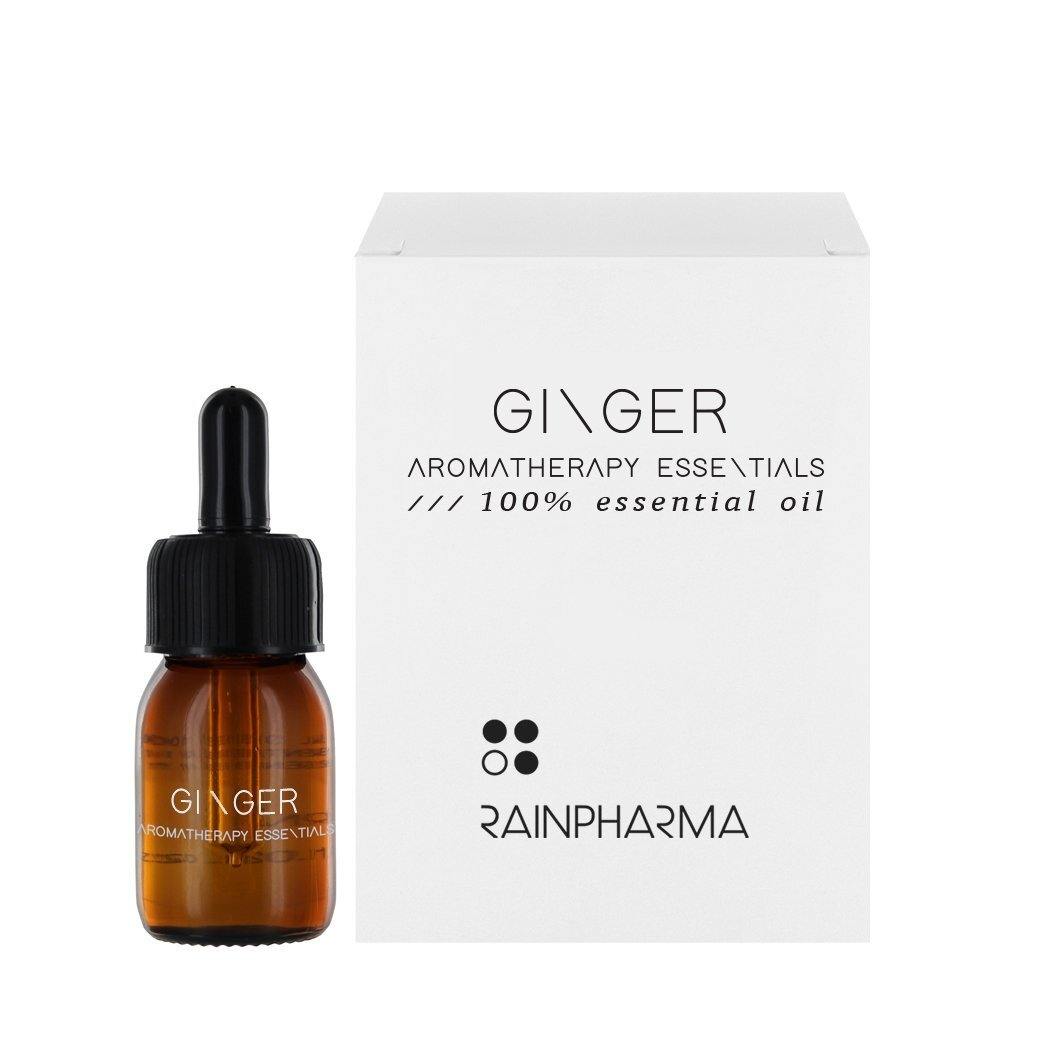 Een bruin glazen druppelflesje met het label "Essentiële olie - Gember" staat naast een wit kader met dezelfde tekst en het RainPharma-logo, wat de kalmerende eigenschappen van gemberolie benadrukt.