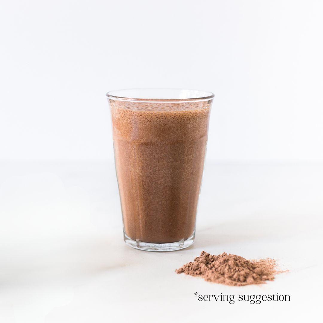 Een glas RainPharma Shake Melkchocolade &