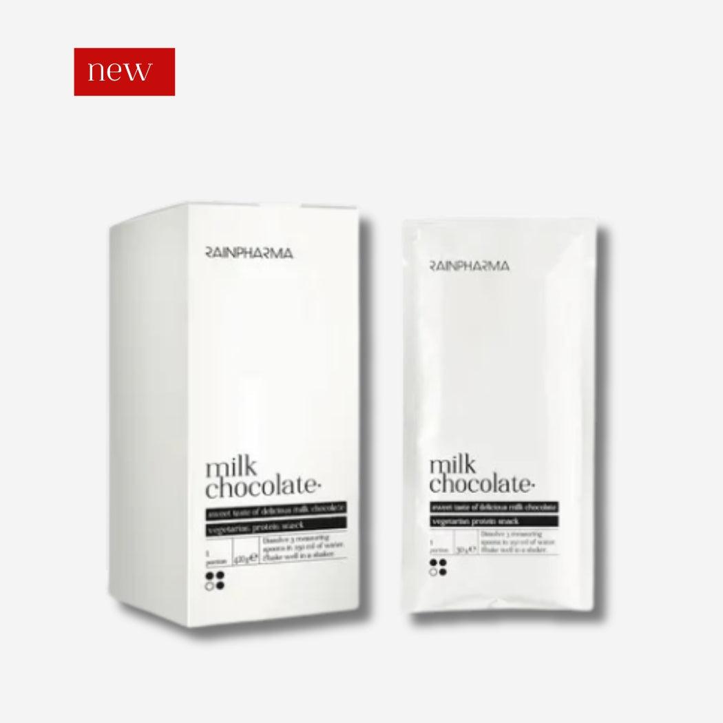 Een wit doosje en zakje met de tekst "RainPharma Shake Milk Chocolate &