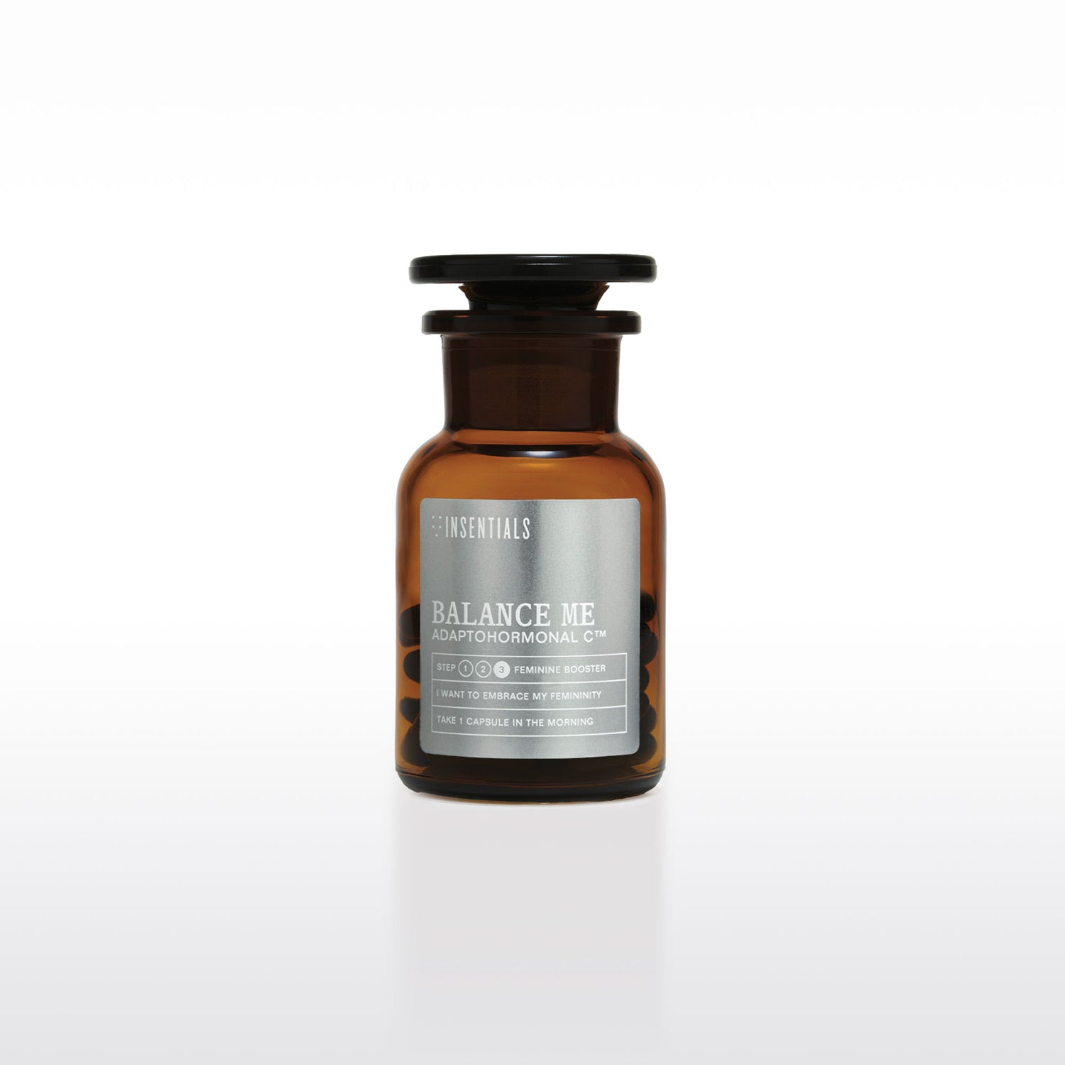 Een bruine glazen fles met het opschrift „Balance Me – Hormonale Balans &amp; Menopauze Support” van Insentials, met maca en rhodiola voor hormonale regulatie, doseringsinstructies, merklogo’s en een effen witte achtergrond.