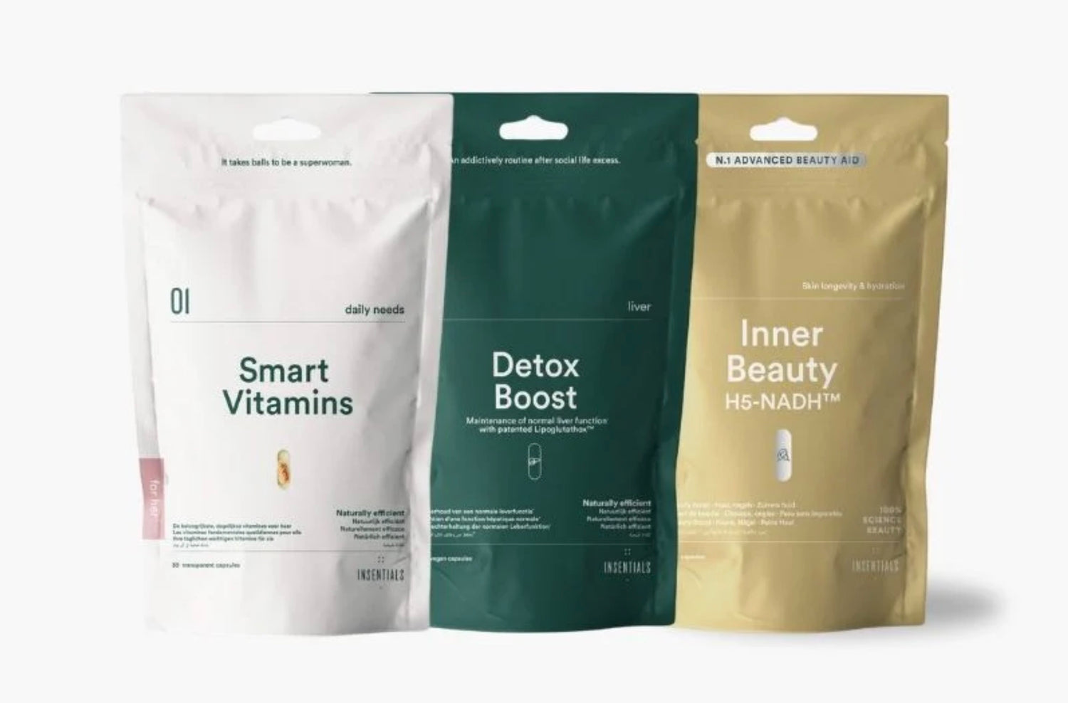 Drie hersluitbare zakjes uit het Smart Inner Beauty Pack van Insentials, samengesteld voor huidverjonging met hyaluronzuur, staan naast elkaar tegen een witte achtergrond.