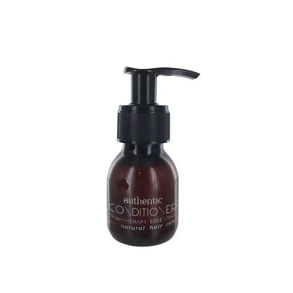 Een bruine pompflacon RainPharma Authentic Conditioner (finishing conditioner) 60 ml - Reisformaat op een witte achtergrond - ideaal voor een natuurlijke wasbeurt en perfect voor op reis.