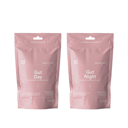 Twee roze hersluitbare zakjes met het opschrift "Insentials - Gut Repair Pack (Day &amp; Night)" staan rechtop op een witte achtergrond, met witte tekst en zijn ontworpen voor darmflora herstel en spijsvertering ondersteuning.
