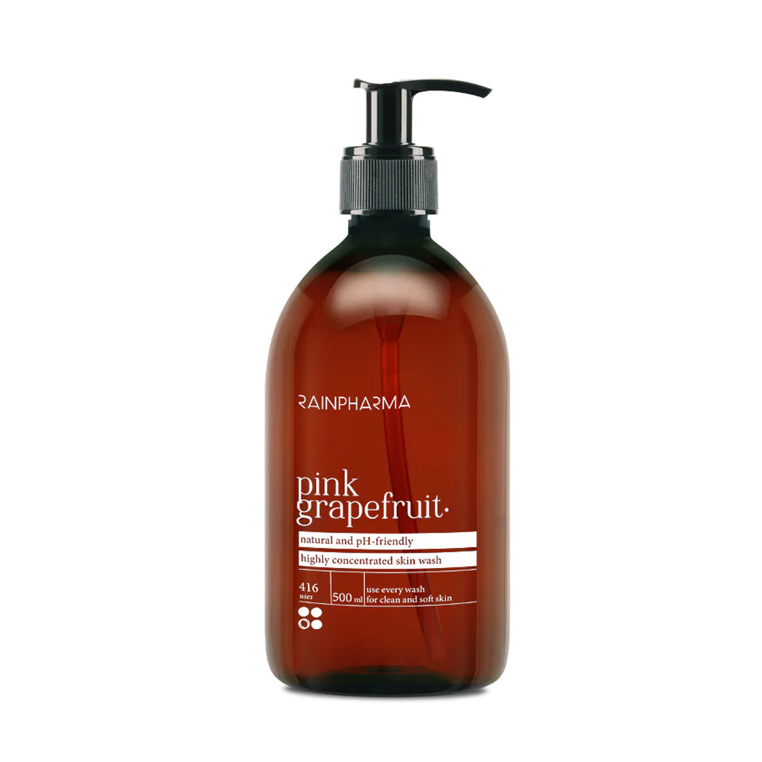 Tegen een witte achtergrond staat een bruine pompflacon van RainPharma Skin Wash Pink Grapefruit, een plantaardige, pH-vriendelijke, zeer geconcentreerde douchegel met aromatherapeutische eigenschappen.