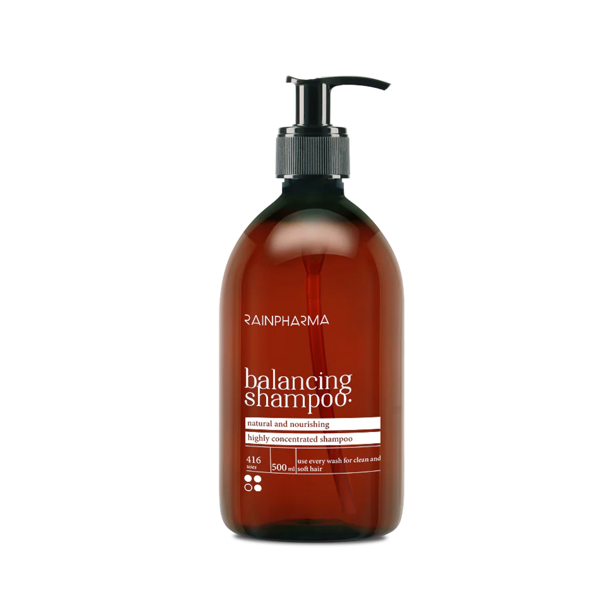 Een bruine pompflacon van 500 ml RainPharma Balancing Shampoo, een natuurlijke en voedende formule voor glanzend haar - perfect voor een gevoelige hoofdhuid.