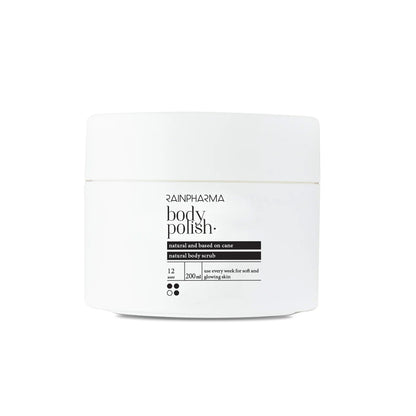 Een witte pot RainPharma Body Polish / Glowing Sugar Cane Scrub bodyscrub met zwarte tekst en een minimalistisch etiket, met 200 ml scrub van suikerriet en essentiële oliën voor een natuurlijk stralende huid.
