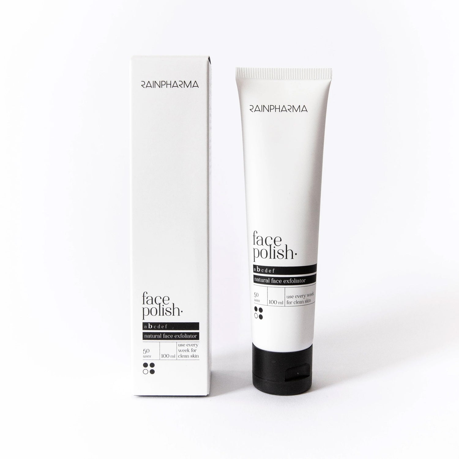 RainPharma Face Polish / Balming Face Polish (alle huidtypes) natuurlijke gezichtsverzorging: deze scrub van RainPharma is te zien in een tube met bijpassende verpakking op een witte achtergrond.