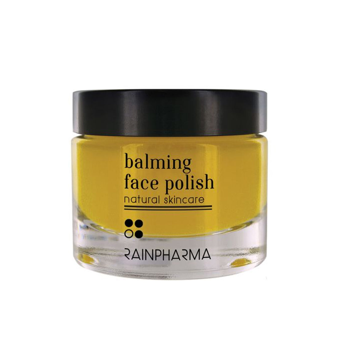 Een doorzichtig potje met een zwart deksel bevat gele Face Polish (balsem voor het gezicht) van RainPharma, gelabeld als natuurlijke gelaatscrub.