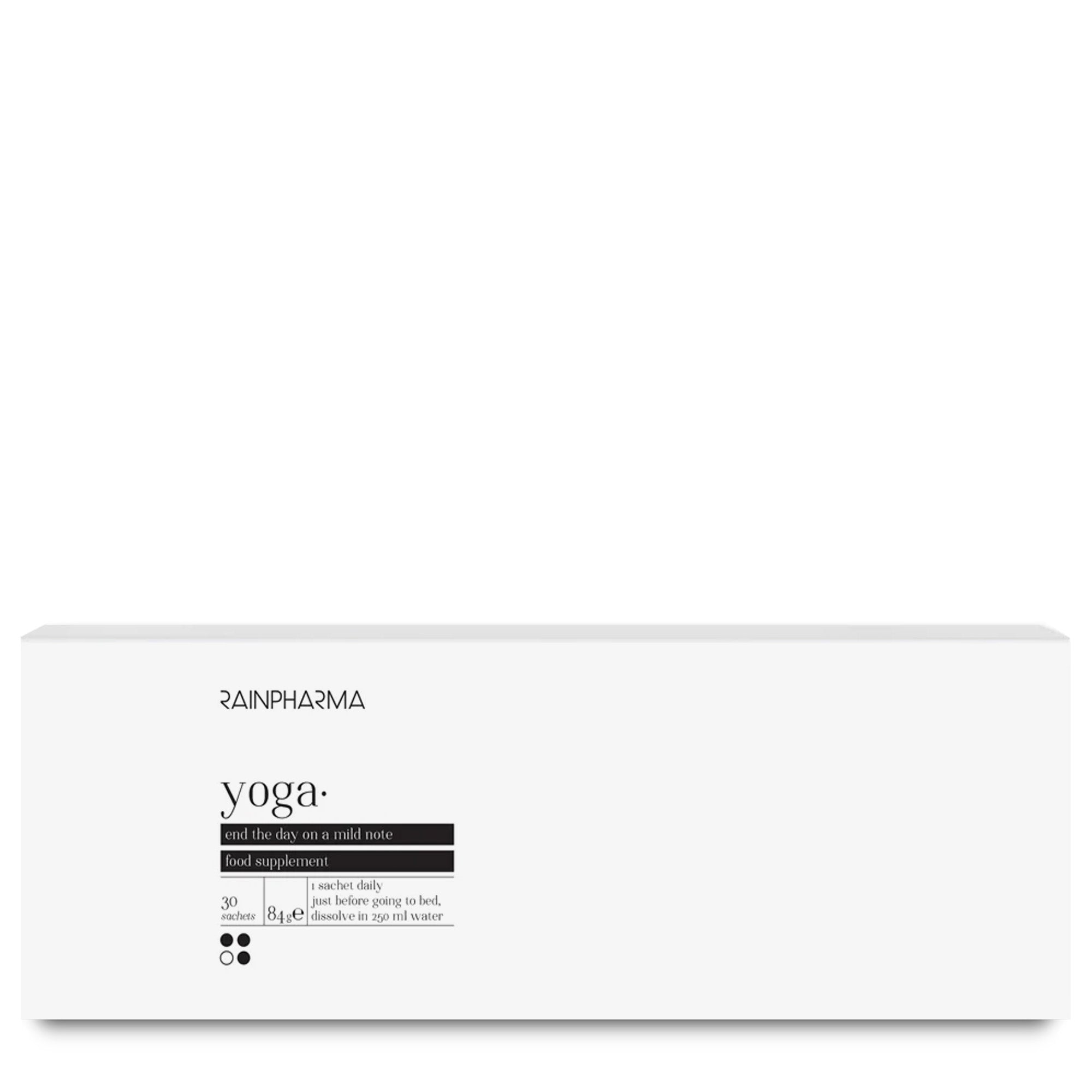 Er staat een rechthoekige witte doos met RainPharma Yoga supplementen, met minimalistische zwarte tekst en branding op de voorkant en met ashwagandha voor natuurlijk evenwicht.