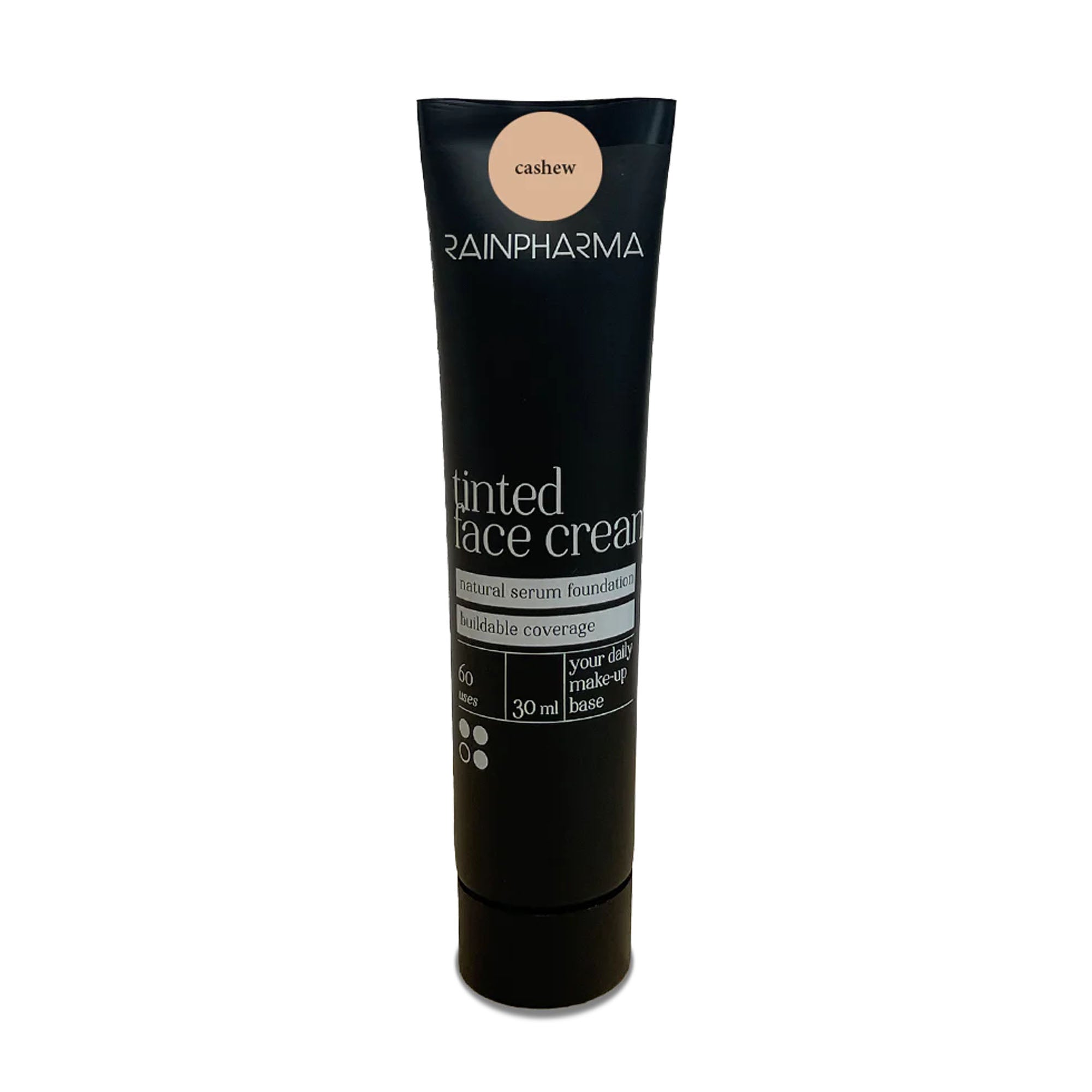 Een tube van 30 ml RainPharma Make Up - Getinte gezichtscrème in de kleur „cashew”, met op de voorkant de vermeldingen „natuurlijke serumfoundation” en „opbouwbare dekking”. Deze veganistische crème biedt bescherming met SPF15 en zorgt voor een stralende en gezond ogende teint.