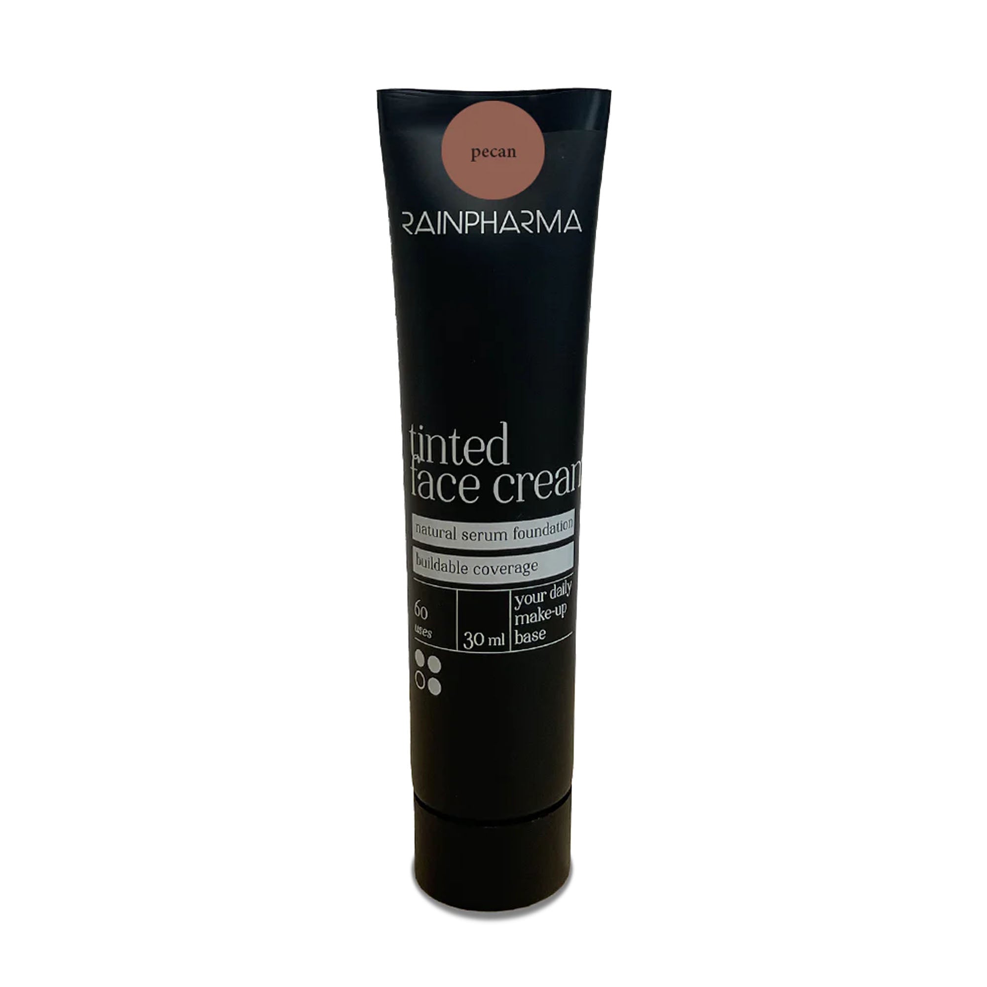 Een zwarte tube met het opschrift „Rainpharma Make Up – Tinted Face Cream“ in de kleur „pecan“ heeft een inhoud van 30 ml en biedt een opbouwbare dekking. Deze veganistische getinte crème van RainPharma biedt zonbescherming met SPF 15, waardoor hij geschikt is voor dagelijks gebruik.
